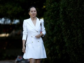 FILE PHOTO: Huawei Technologies Chief Financial Officer Meng Wanzhou leaves her home to appear in British Columbia supreme court for a hearing, in Vancouver, British Columbia, Canada September 30, 2019.