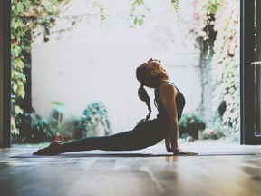 A woman does a yoga pose. Today's Instagram-conscious instructors are falling victim to injuries because they are attempting challenging poses that will look good on social media, experts have warned.