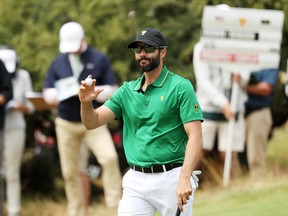 Adam Hadwin of Canada and the International team reacts to his birdie to go 1up on the first green during Friday foursome matches on day two of the 2019 Presidents Cup at Royal Melbourne Golf Course in Melbourne, Australia. Hadwin lost the match. (Photo by Rob Carr/Getty Images)