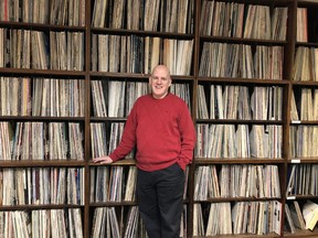 Bill Blair, music and media librarian at the University of Victoria, with some of what will remain of the UVic Libraries's vinyl collection after they auction off more than 5,900 records this week. [PNG Merlin Archive]