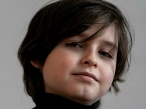Belgian student Laurent Simons, nine years old, poses during a photo session at his home on November 21, 2019 in Amsterdam.