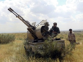 A fighters loyal to Libya's Government of National Accord (GNA) mans a position west of the city of Aziziah, some 60 kilometres southwest of the capital Tripoli, on April 14, 2019.