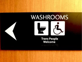 New washroom signage at Vancouver City Hall is being updated to state, "Trans people welcome."