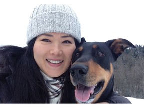 Nanami  Ushiroji and her dog, Coby. Ushiroji of North Vancouver was traumatized when she took her dog out for a walk and the animal died after being electrocuted on a sidewalk, according to a lawsuit filed in B.C. Supreme Court.