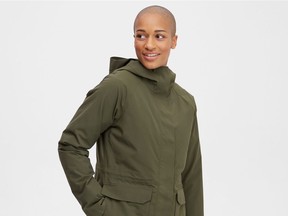 A model wears the MEC Transference 3 in 1 Down Parka.