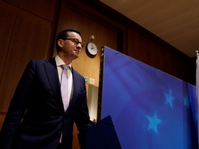 Poland's Prime Minister Mateusz Morawiecki arrives for a press conference during a European Union Summit at the Europa building in Brussels on December 13, 2019.