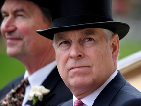 FILE PHOTO: Horse Racing - Royal Ascot - Ascot Racecourse, Ascot, Britain - June 20, 2019   Britain's Prince Andrew arrives by horse and carriage on ladies day. REUTERS/Toby Melville/File Photo