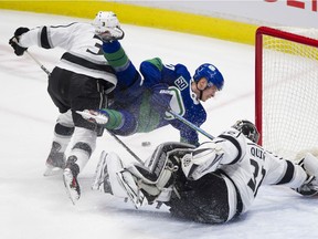 Elias Pettersson looked about to score when he moved to deke Jonathan Quick, but the veteran LA netminder poke-checked the puck away.