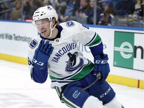 Vancouver Canucks' Brock Boeser smiles after scoring during the first period of an NHL hockey game against the St. Louis Blues, Sunday, Dec. 9, 2018, in St. Louis.