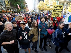 Thousands join a climate strike march at the Vancouver Art Gallery in Vancouver, British Columbia, Canada October 25, 2019.
