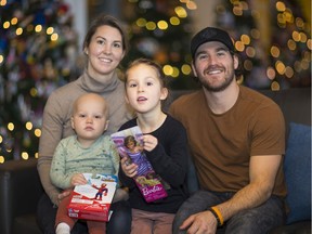 The Stanley family of Armstrong, who will be celebrating Christmas at Ronald McDonald House in Vancouver while their toddler Finnley goes through chemo treatments. Mom Jenell holds Finnley, while daughter Mayelle and father Jordan look on.