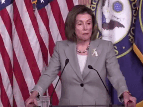 In the video, Pelosi appears to move her lips slightly before raising a glass of water to her mouth.