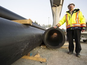 Don Ehrenholz, VP of Engineering at YVR, with pipes from the Geoexchange thermal heating system being installed at the airport.