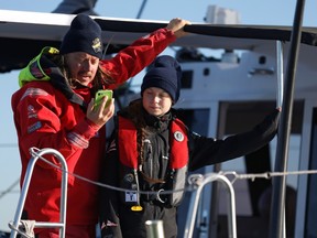 Climate change activist Greta Thunberg arrives with her father aboard the yacht La Vagabonde at Santo Amaro port in Lisbon, Portugal December 3, 2019.
