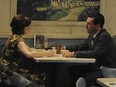 Elisabeth Moss and Jon Hamm as Peggy and Don in Mad Men's "The Suitcase."