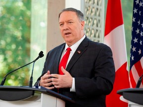 U.S. Secretary of State Mike Pompeo speaks during a joint press conference with Canadian Foreign Minister Chrystia Freeland (off frame) at the National Arts Center, on August 22, 2019, in Ottawa.
