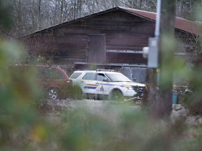 RCMP officers on the property at 2939 224th St, Langley. IHIT is investigating the death of 67-year-old Dennis Johnston, found Christmas Eve.