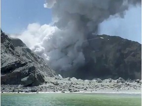 Thick smoke from the volcanic eruption of Whakaari, also known as White Island, is seen from a distance of a vessel in New Zealand, December 9, 2019, in this image obtained via social media. @SCH via REUTERS     ATTENTION EDITORS - THIS IMAGE HAS BEEN SUPPLIED BY A THIRD PARTY. MANDATORY CREDIT. NO RESALES. NO ARCHIVES.