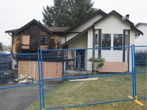 Burned-out recovery house operated by Step by Step, on 138A Street in Surrey.