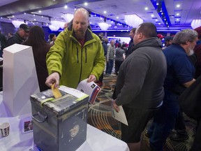 Transit workers from Coast Mountain Bus Company locals 111 and 2200 vote whether to ratify a contract agreement, in Surrey, BC Thursday, December 5, 2019. (