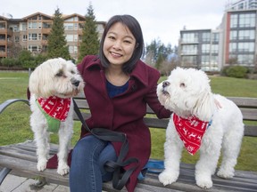 UBC assistant psychology professor Nancy Sin with her dogs Luke and Muffet, who help reduce the usual daily stressors in her life.