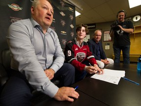 Vancouver Giants' GM Barclay Parneta, left, celebrated the signing of Cole Shepard with team owner Ron Toigo at Ladner Leisure Centre in July 10. The GM might make more moves before the Jan. 10 WHL trade deadline.