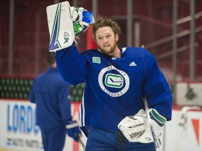 Goalie Thatcher Demko takes a breather during Canucks practice at Rogers Arena on Oct. 9, 2019.