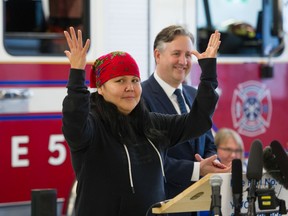 Resident Melanie Lecoy speaks during official opening of Fire Hall No. 5 with Vancouver Mayor Kennedy Stewart.