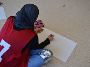 Surrey schools use art classes to help refugee children deal with the trauma they have suffered during conflicts in their home countries.
