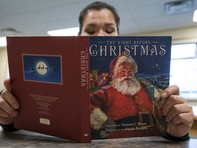 Clarissa, an inmate at Fraser Valley Institution, reads "Twas the Night Before Christmas" as part of the Elizabeth Fry Storybook program.