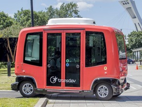 A self-driving shuttle leaves Marché Maisonneuve for the Olympic Stadium in a demonstration of the autonomous vehicle pilot project in Montreal on June 27, 2019.