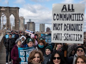NEW YORK, NY - JANUARY 05: People participate in a Jewish solidarity march across the Brooklyn Bridge on January 5, 2020 in New York City. The march was held in response to a recent rise in anti-Semitic crimes in the greater New York metropolitan area.