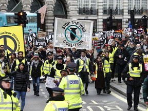 Protestors march from BBC's headquarters in Portland Place to Trafalgar Sq in a rally against war with Iran on January 11, 2020 in London, England.