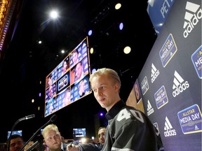 Elias Pettersson of the Vancouver Canucks speaks to reporters during Thursday's Media Day for the 2020 NHL All-Star Game at Stifel Theatre in St Louis, Miss. Jacob Markstrom and Quinn Hughes, also of the Canucks, are taking part in the event, too.