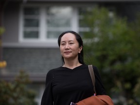 Huawei chief financial officer Meng Wanzhou leaves her home to attend a court hearing in Vancouver on Wednesday October 2, 2019.