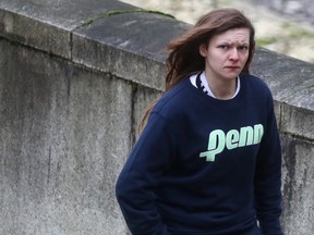 Gemma Watts, a British woman who pledged guilty for posing as a teenage boy to sexually groom young girls, walks to the Winchester Crown Court in Winchester, Britain, Jan. 10, 2020. (REUTERS/Simon Dawson)