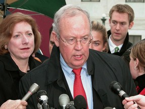 In this file photo taken on Dec. 7, 2004, attorney Kenneth Starr, former special prosecutor who investigated former U.S. President Bill Clinton, speaks to reporters outside the U.S. Supreme Court in Washington, D.C.