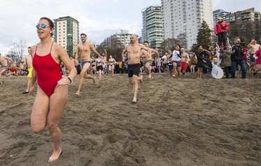 The Vancouver Parks Board holds the 100th annual Polar Bear Swim at English Bay beach