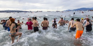 The Vancouver Parks Board holds the 100th annual Polar Bear Swim at English Bay beach