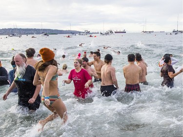 The Vancouver Parks Board holds the 100th annual Polar Bear Swim at English Bay beach