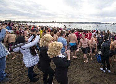 The Vancouver Parks Board holds the 100th annual Polar Bear Swim at English Bay beach