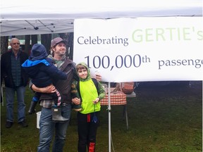 Gabriola Island's Stephen Levesque (pictured with his two sons) was the 100,000th passenger on the island's GERTIE Community Bus.
