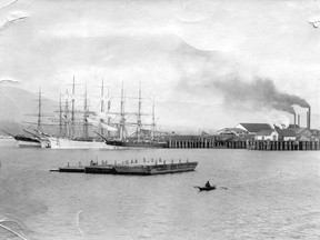 Ships loading lumber at Hastings Saw Mill in Vancouver, 1896.