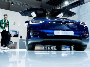 A Tesla Model X car is displayed during a press day at the Brussels Motor Show on Jan. 9, 2020 in Brussels, Belgium.