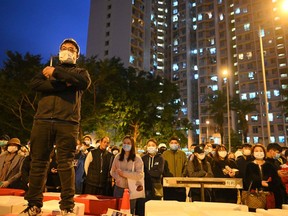 Residents set up barricades near the vacant Fai Ming Estate to protest against plans for the estate to be used as a quarantine camp for patients and frontline medical staff of a coronavirus outbreak that began in the Chinese city of Wuhan, in the Fanling district in Hong Kong on Jan. 26, 2020.