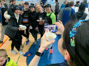 Hamming it up for post-race photos, members of the Mile2Marathon group pose after completing Sunday's Steveston Icebreaker 8K, which attracted a record turnout and blazing fast performances.