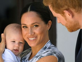 Britain's Prince Harry and his wife Meghan, Duchess of Sussex, holding their son Archie in September, 2019.