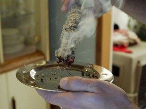 A Port Alberni mother argued the religious freedoms of her children were infringed upon by having to participate in smudging and hoop dance ceremonies, but the B.C. Supreme Court says she did not prove an infringement. Pictured here, a file photo of burning for a type of smudge.
