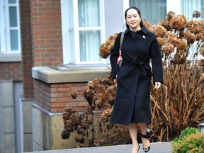 Huawei chief financial officer Meng Wanzhou leaves her Vancouver home for an extradition hearing in British Columbia Supreme Court, on January 21, 2020 in Vancouver, British Colombia.