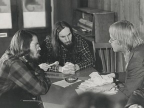 Georgia Straight staffers Mason Dixon (left) and Ken Lester (center) meet with editor Dan McLeod in this 1972 file photo.